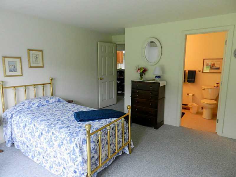 5 Wonderbrook Drive, Unit 5 Kennebunk, ME 04043 - Photo 16 of 25 Bedroom. First Floor Bedroom with Bath