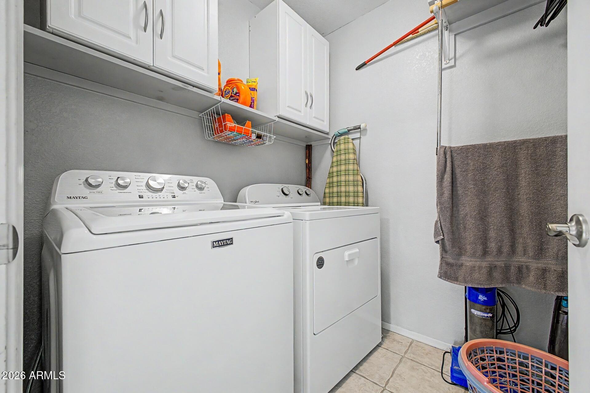 6335 East Brown Road, Unit 1144 Mesa, AZ 85205 - Photo 24 of 28 a utility room with dryer and washer