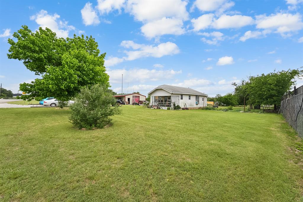 4948 Tin Top Road Weatherford, TX 76087 - Photo 3 of 24 a view of a house with a big yard