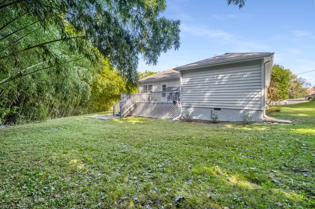 an aerial view of a house with a garden