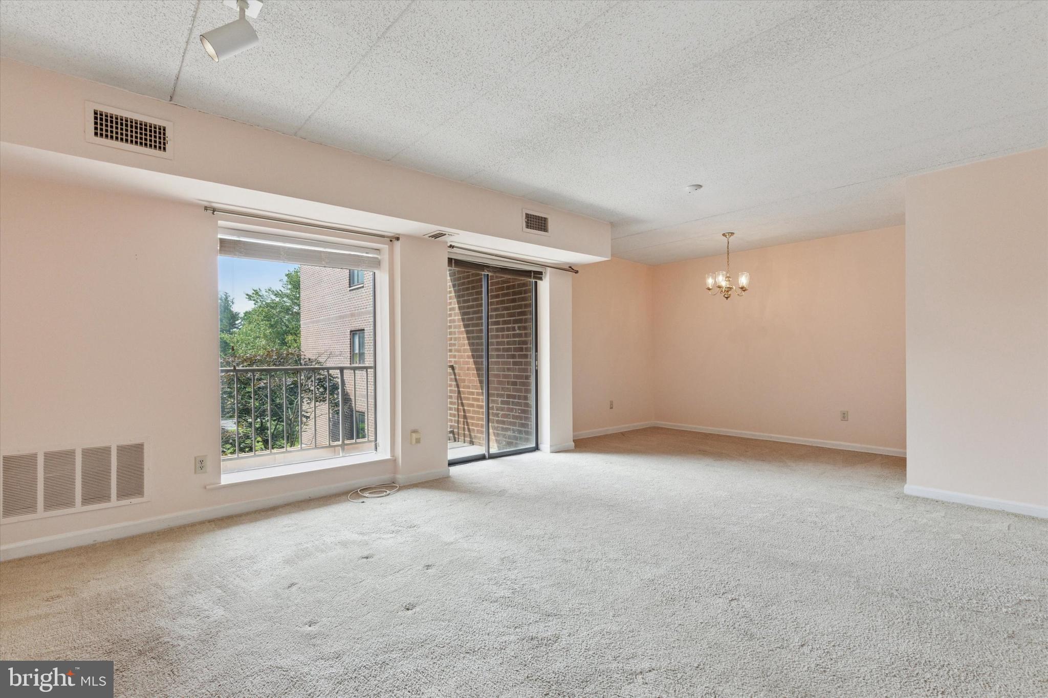 1219 West Wynnewood Road, Unit 400 Wynnewood, PA 19096 - Photo 5 of 15 a view of an empty room with a window