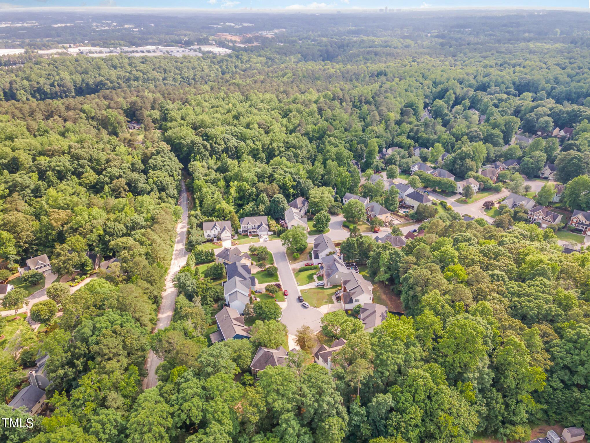 8816 Valley Springs Place Raleigh, NC 27615 - Photo 4 of 37 001_dji_0046-edit_391