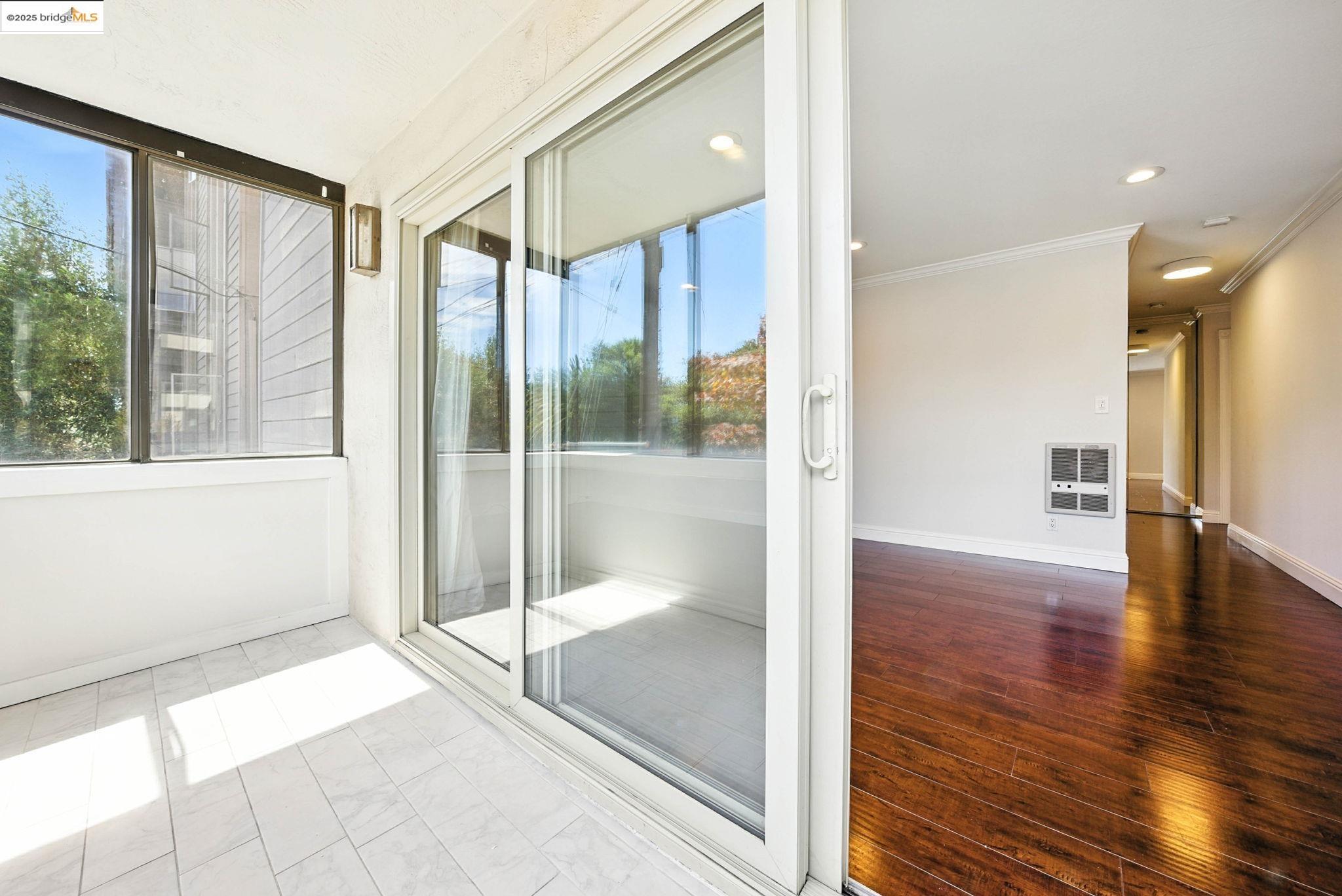 567 Oakland Avenue, Unit 101 Oakland, CA 94611 - Photo 20 of 50 Enjoy the sunlight, easy access from the living/dining area