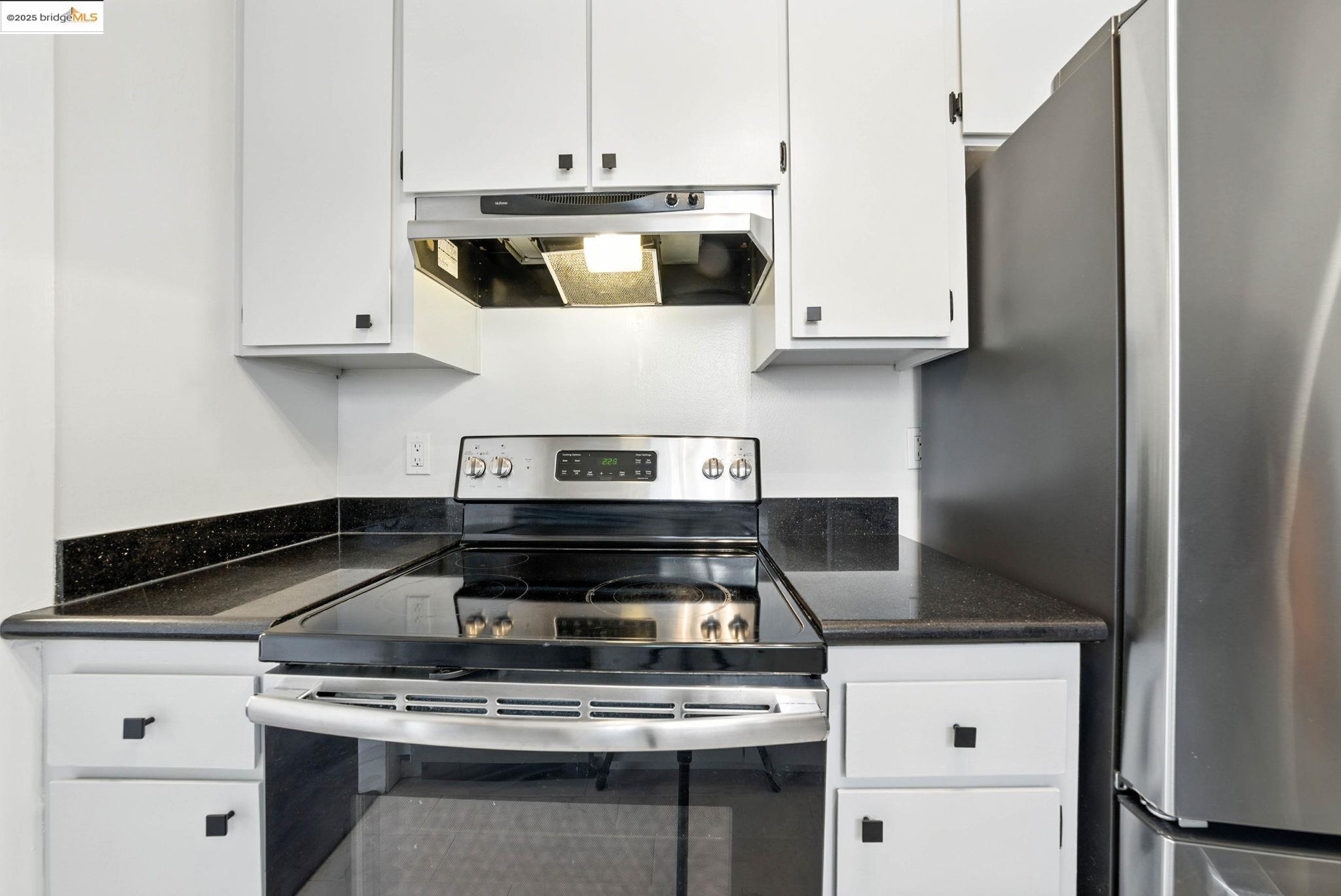 567 Oakland Avenue, Unit 101 Oakland, CA 94611 - Photo 27 of 50 Cabinets recently painted with new hardware