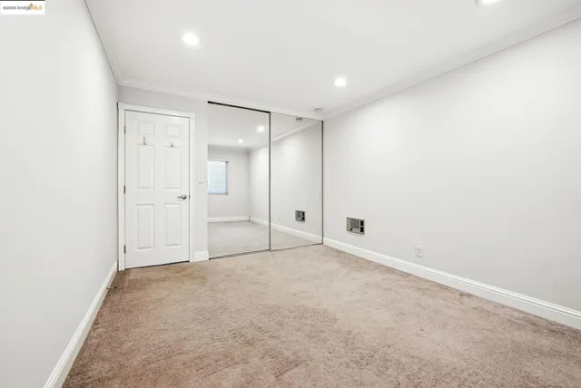 a bathroom with a mirror sink and double vanity