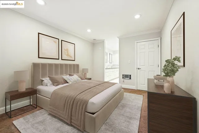 a spacious bedroom with a bed and a couch