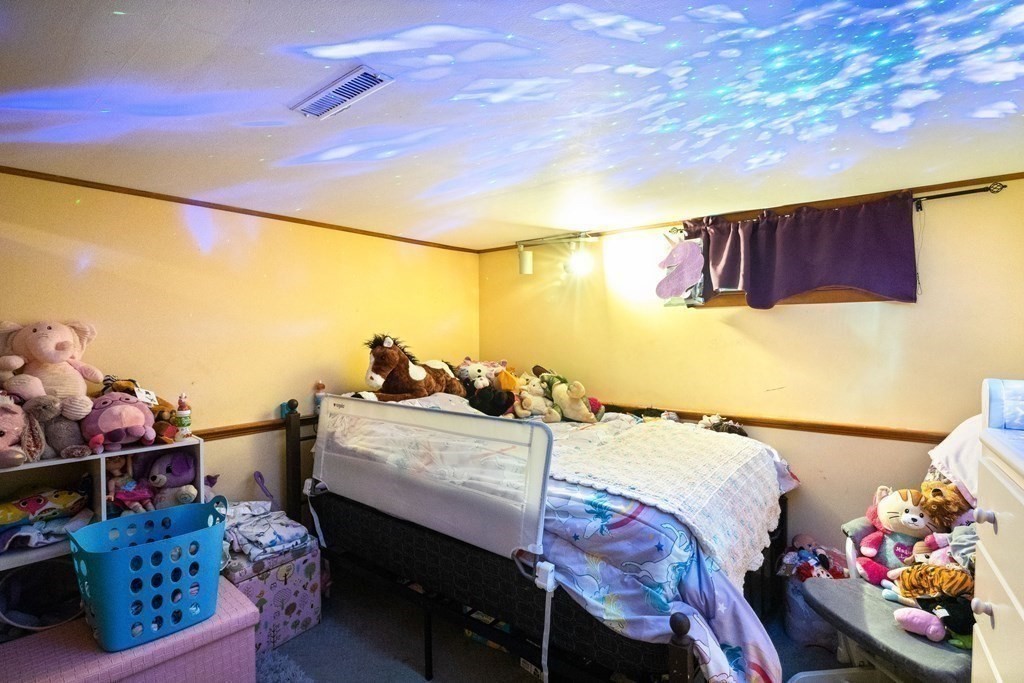 14 Tower Circle Bourne, MA 02532 - Photo 15 of 19 a bed room with a bed