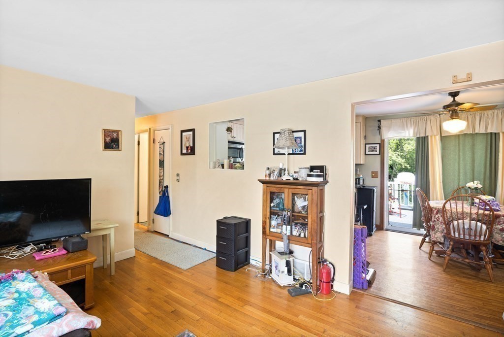 14 Tower Circle Bourne, MA 02532 - Photo 6 of 19 a living room with furniture and a flat screen tv