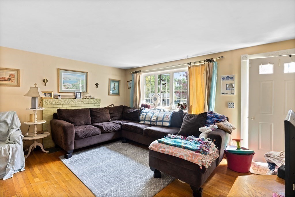 14 Tower Circle Bourne, MA 02532 - Photo 7 of 19 a living room with furniture and a large window