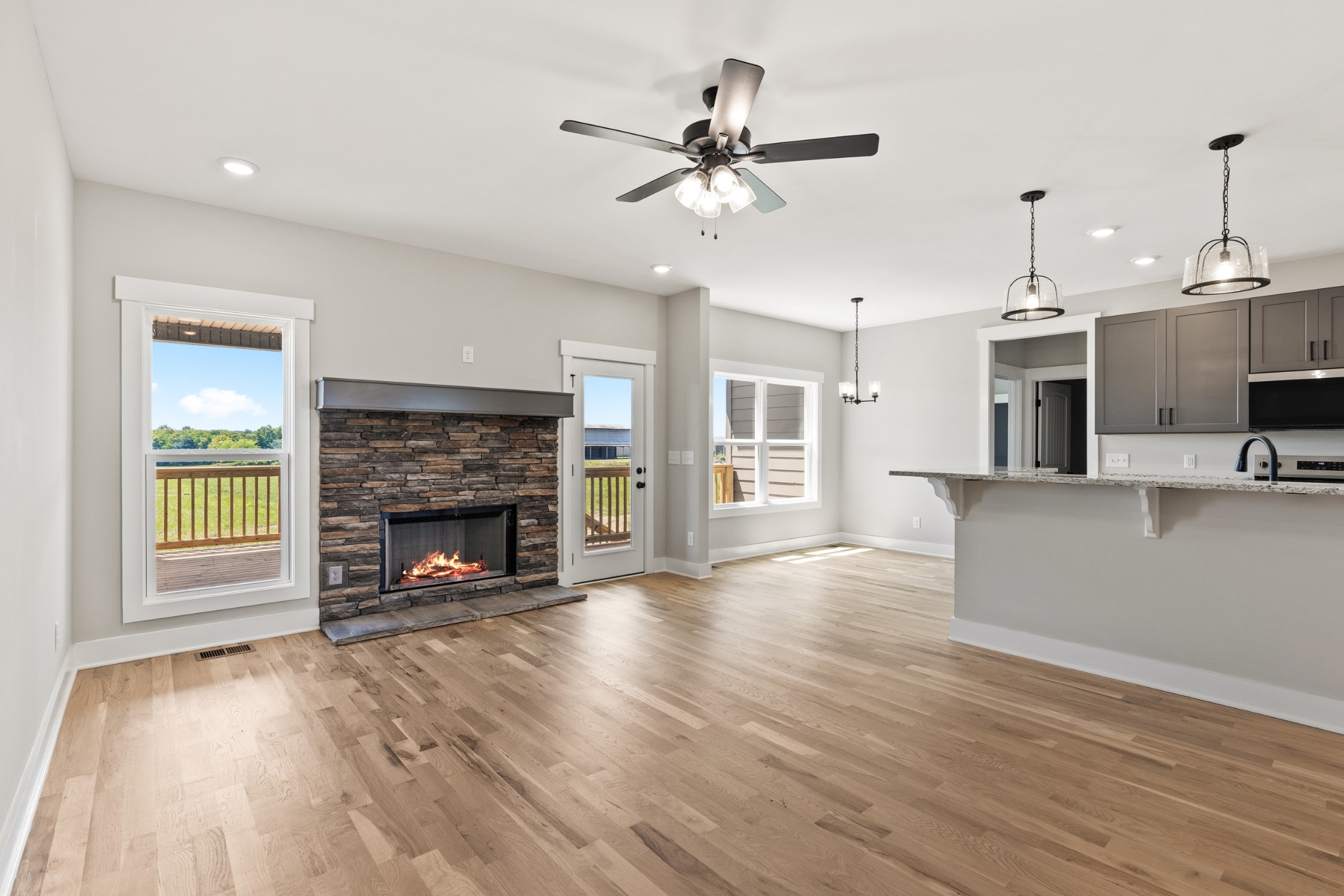5638 Borthick Road Springfield, TN 37172 - Photo 2 of 43 a view of a living room a kitchen and a fireplace