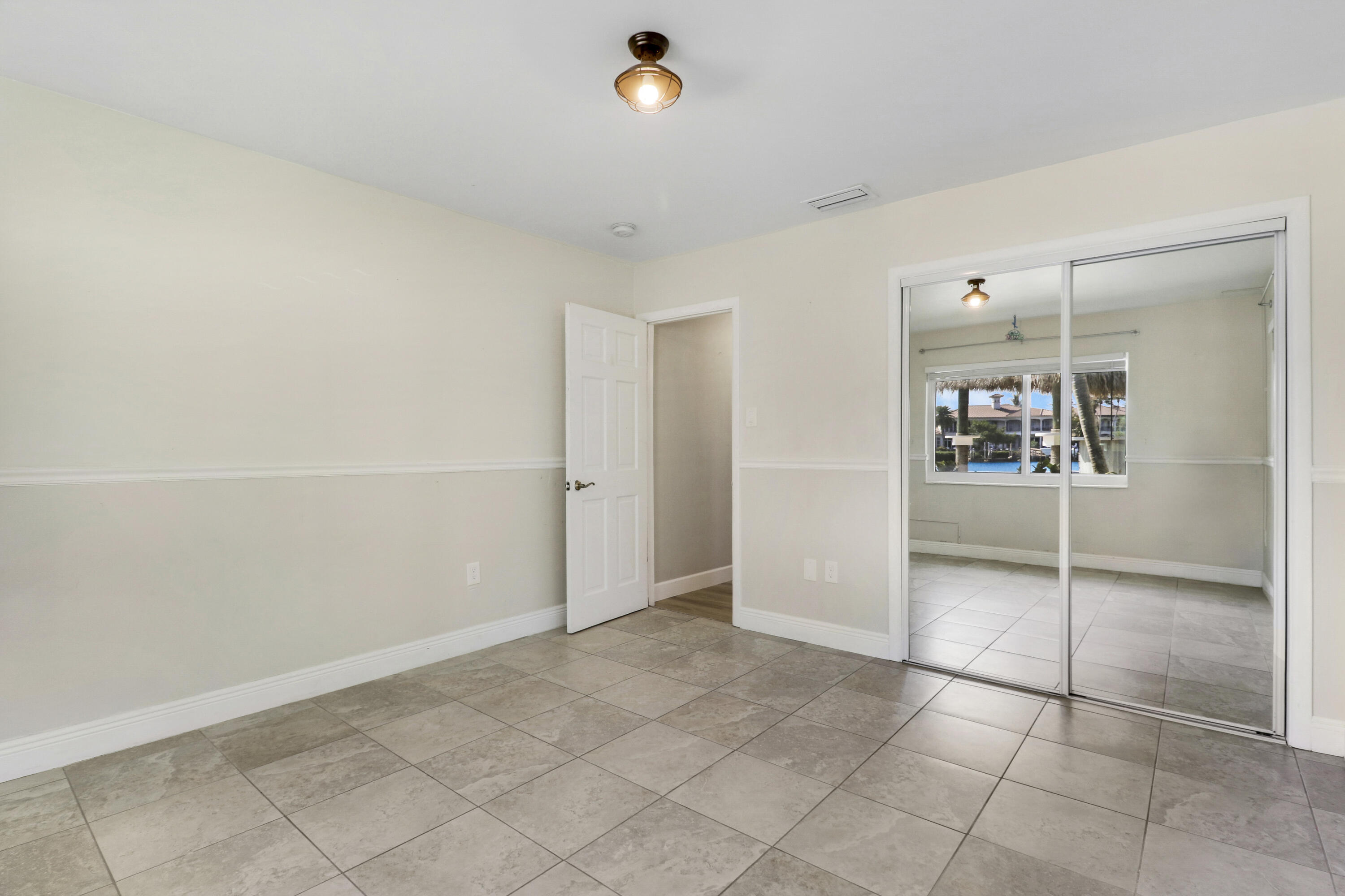9195 Southeast Cove Point Street Jupiter, FL 33469 - Photo 48 of 80 Bedroom