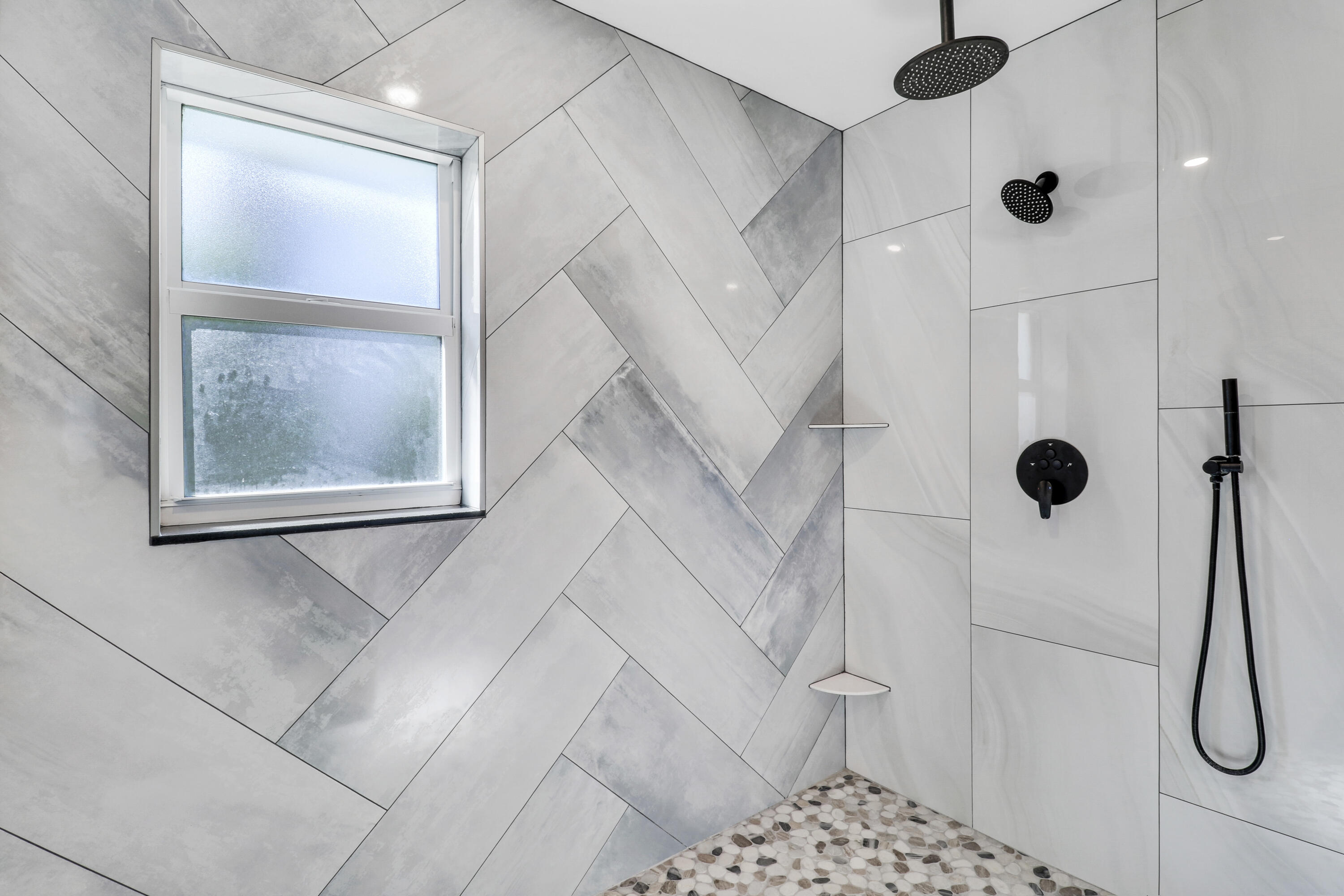 9195 Southeast Cove Point Street Jupiter, FL 33469 - Photo 54 of 80 a bathroom with a shower