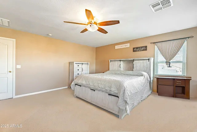 a bathroom with a sink double vanity and a mirror