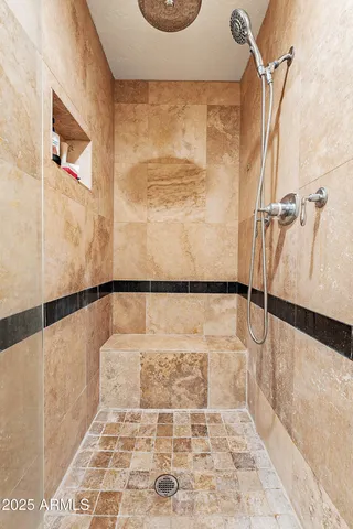 a view of a livingroom with furniture and a window