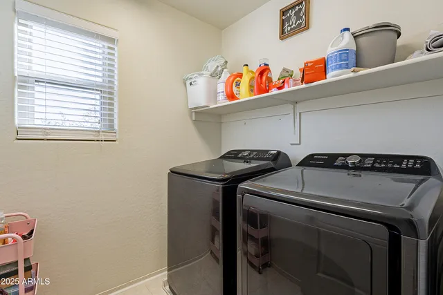 a view of a house with swimming pool and a yard