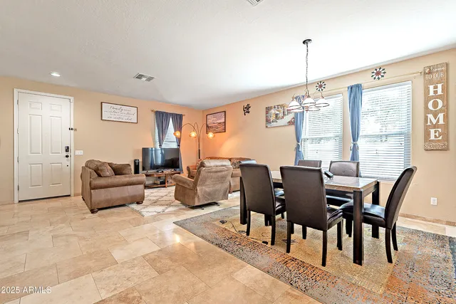 a view of a dining room with furniture