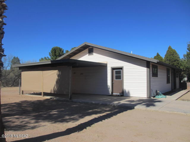 1160 Avenida Leon Rio Rico, AZ 85648 - Photo 4 of 47 a front view of a house with a yard