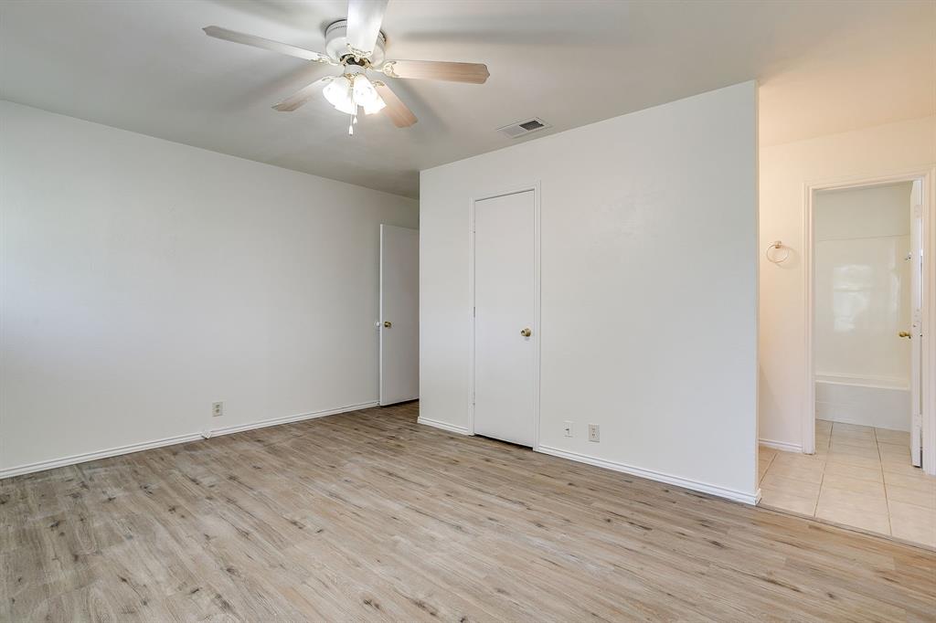 1203 North Nolan River Road, Unit A Cleburne, TX 76033 - Photo 13 of 20 wooden floor in an empty room