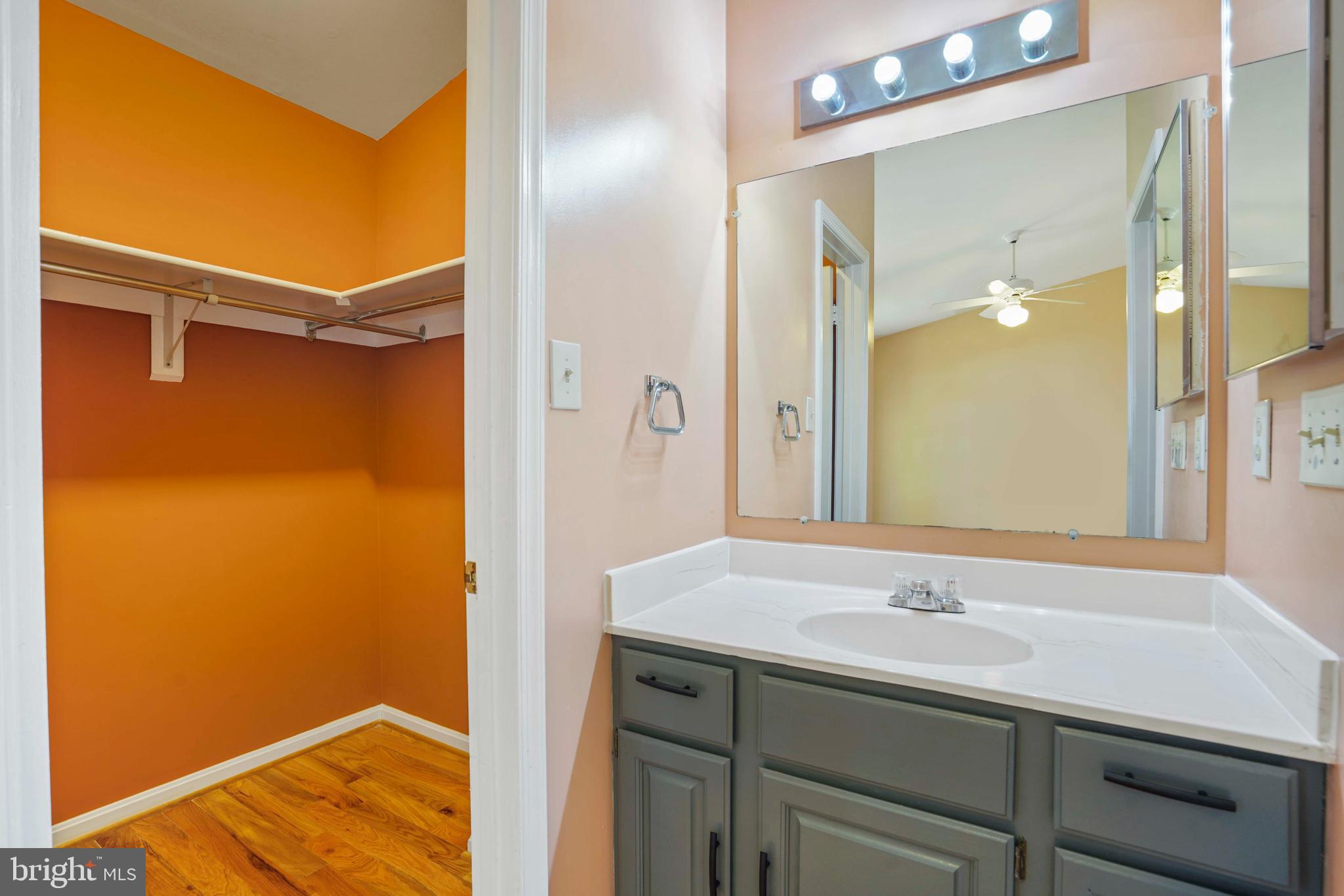 11322 Baritone Court Silver Spring, MD 20901 - Photo 13 of 29 a bathroom with a sink and a mirror