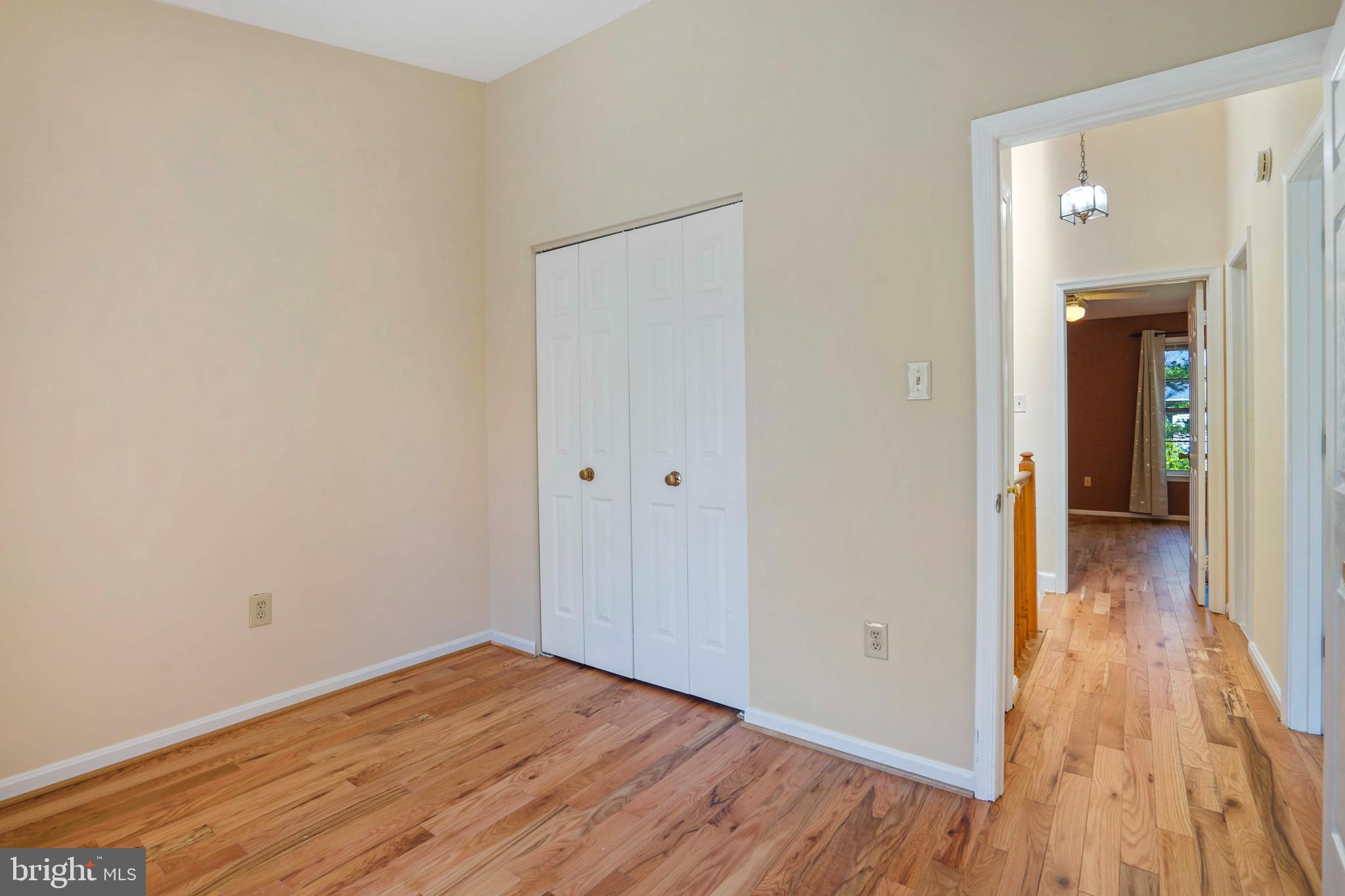 11322 Baritone Court Silver Spring, MD 20901 - Photo 18 of 29 wooden floor in a gallery