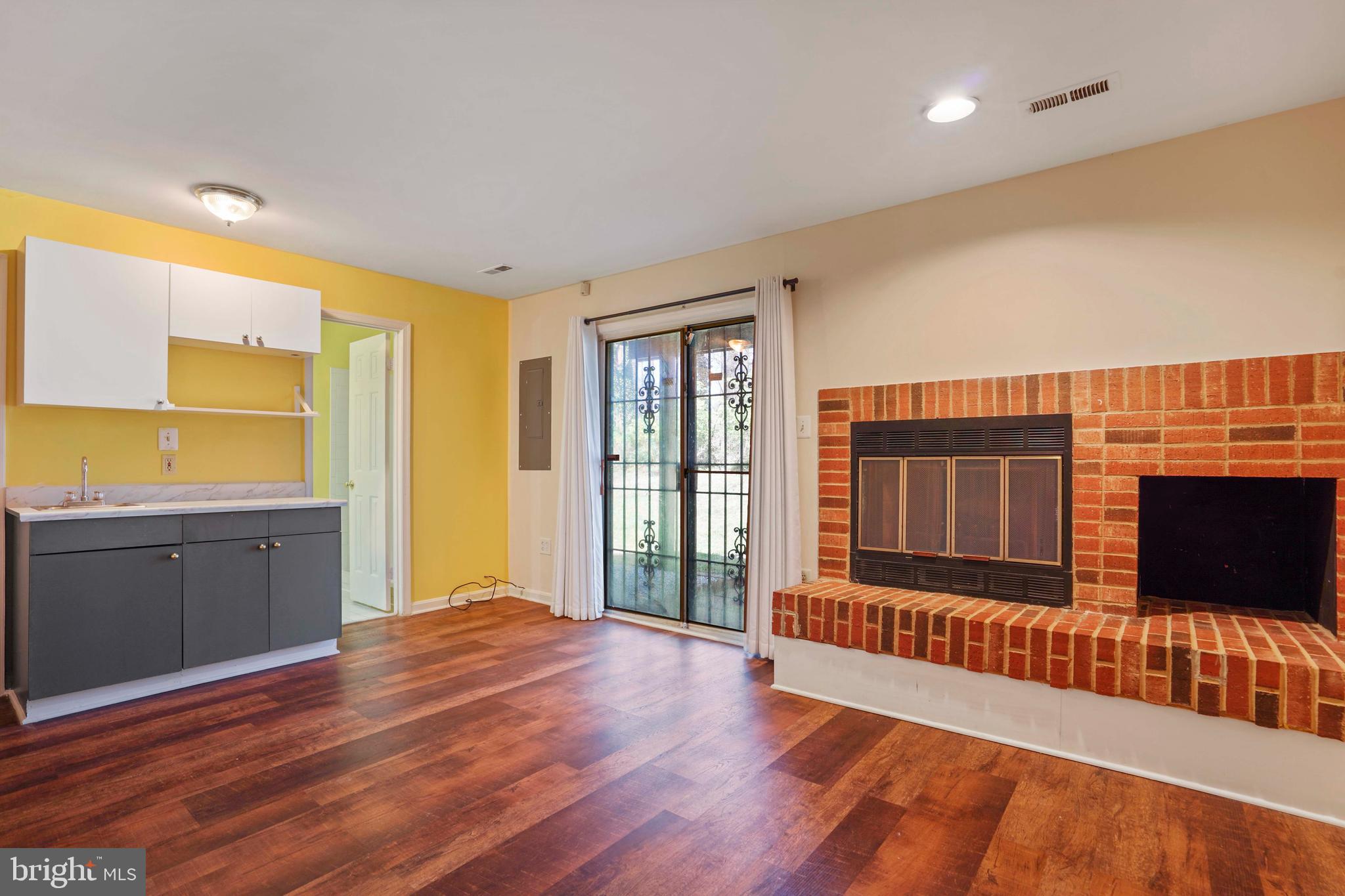 11322 Baritone Court Silver Spring, MD 20901 - Photo 23 of 29 a bedroom with furniture and wooden floor