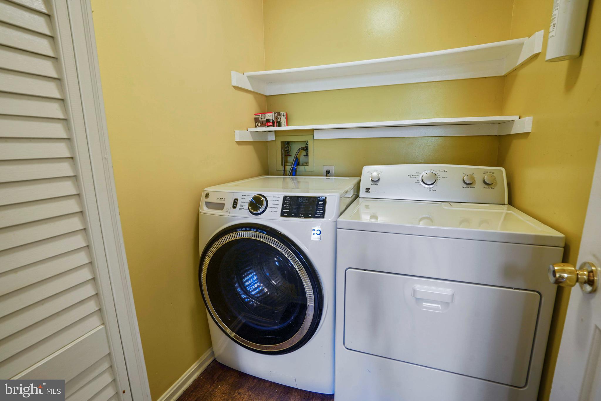 11322 Baritone Court Silver Spring, MD 20901 - Photo 28 of 29 a utility room with dryer and washer