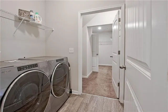 a view of a bathroom with washing machine