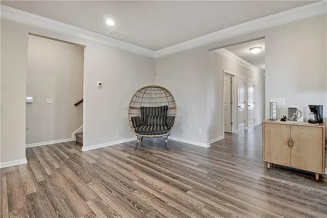 a view of a kitchen cabinets and wooden floor
