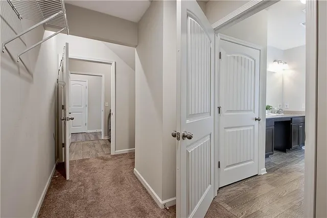 a view of a room with a wardrobe space
