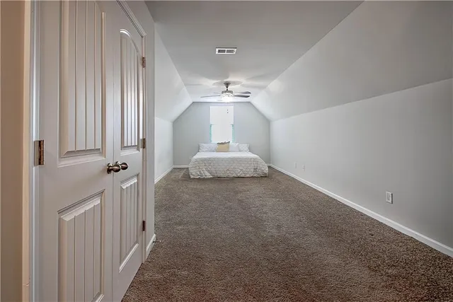 a view of a bedroom with a large bed