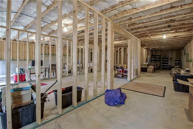 a view of a room with wooden walls