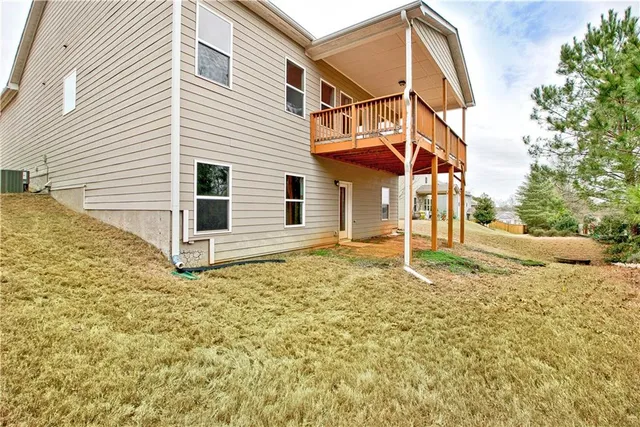a view of a balcony with wooden floor