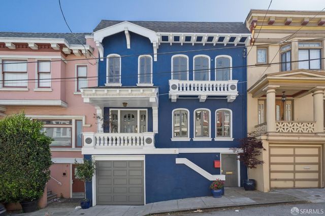 a front view of a house with a balcony