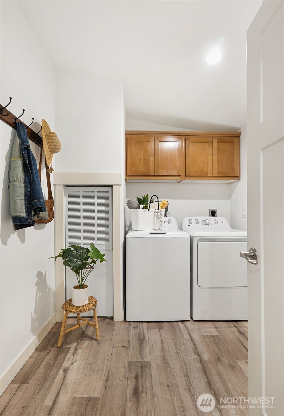 2815 Middle Shore Road Snohomish, WA 98290 - Photo 16 of 26 a utility room with cabinets washer and dryer