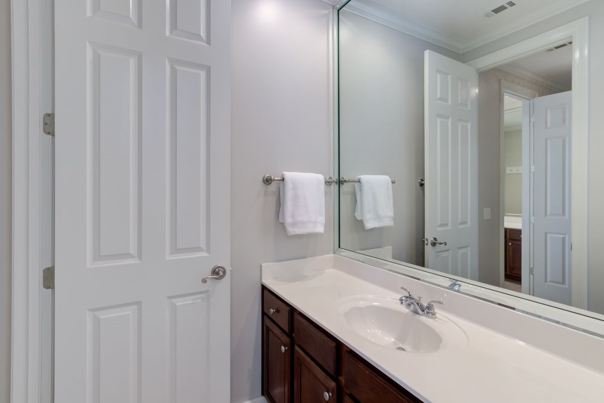 9465 Johnson Rd Extension Germantown, TN 38139 - Photo 18 of 25 The 2nd full bath downstairs is a jack-n-jill shared by bedrooms 2 & 3.