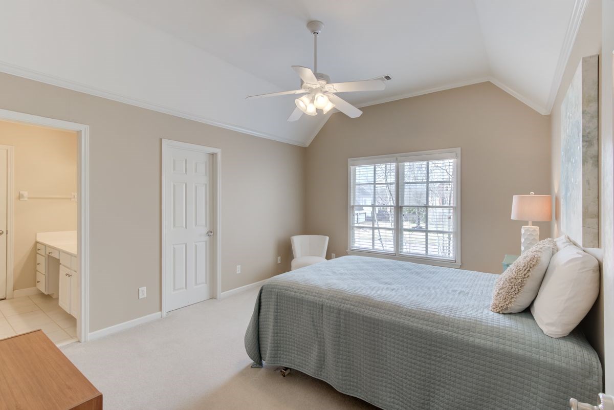 9465 Johnson Rd Extension Germantown, TN 38139 - Photo 19 of 25 Bedroom 4 is upstairs with vaulted ceilings, walk-in closet, and a jack-n-jill bath.