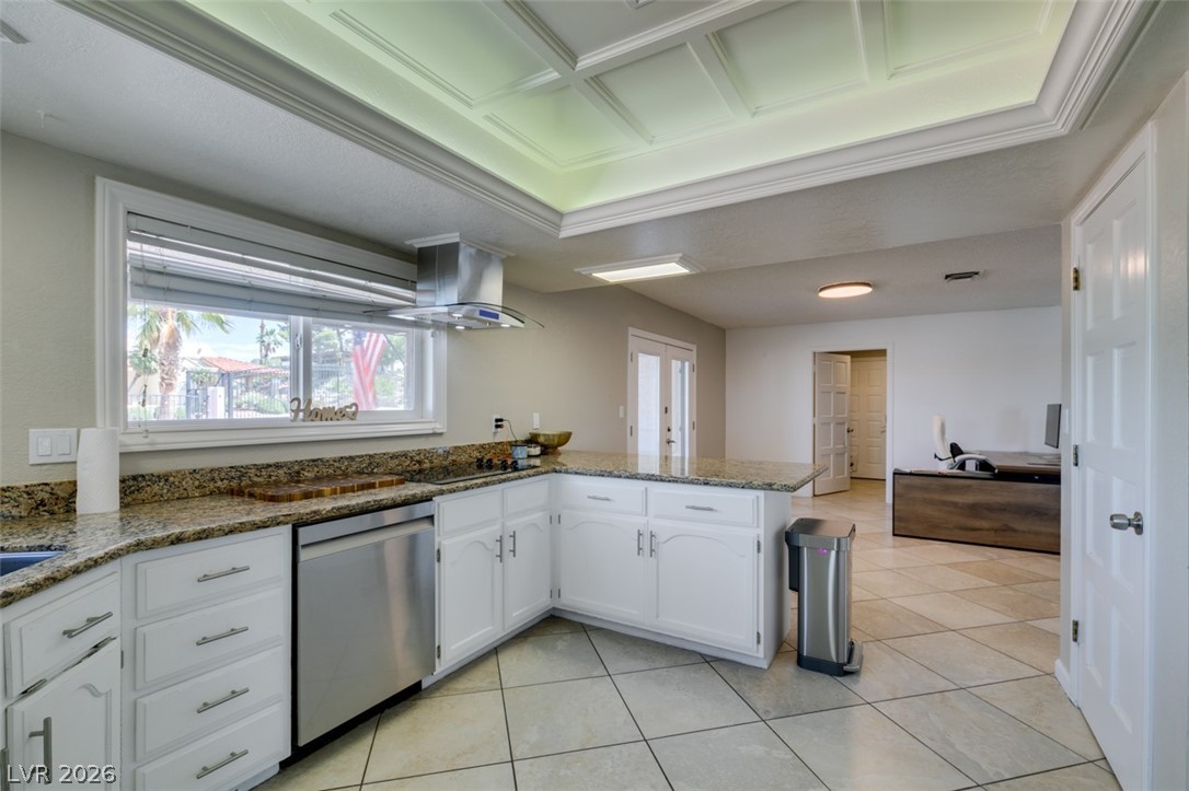 892 North Hollywood Boulevard Las Vegas, NV 89110 - Photo 12 of 81 Bright, open-concept kitchen with granite counters and recessed lighting.