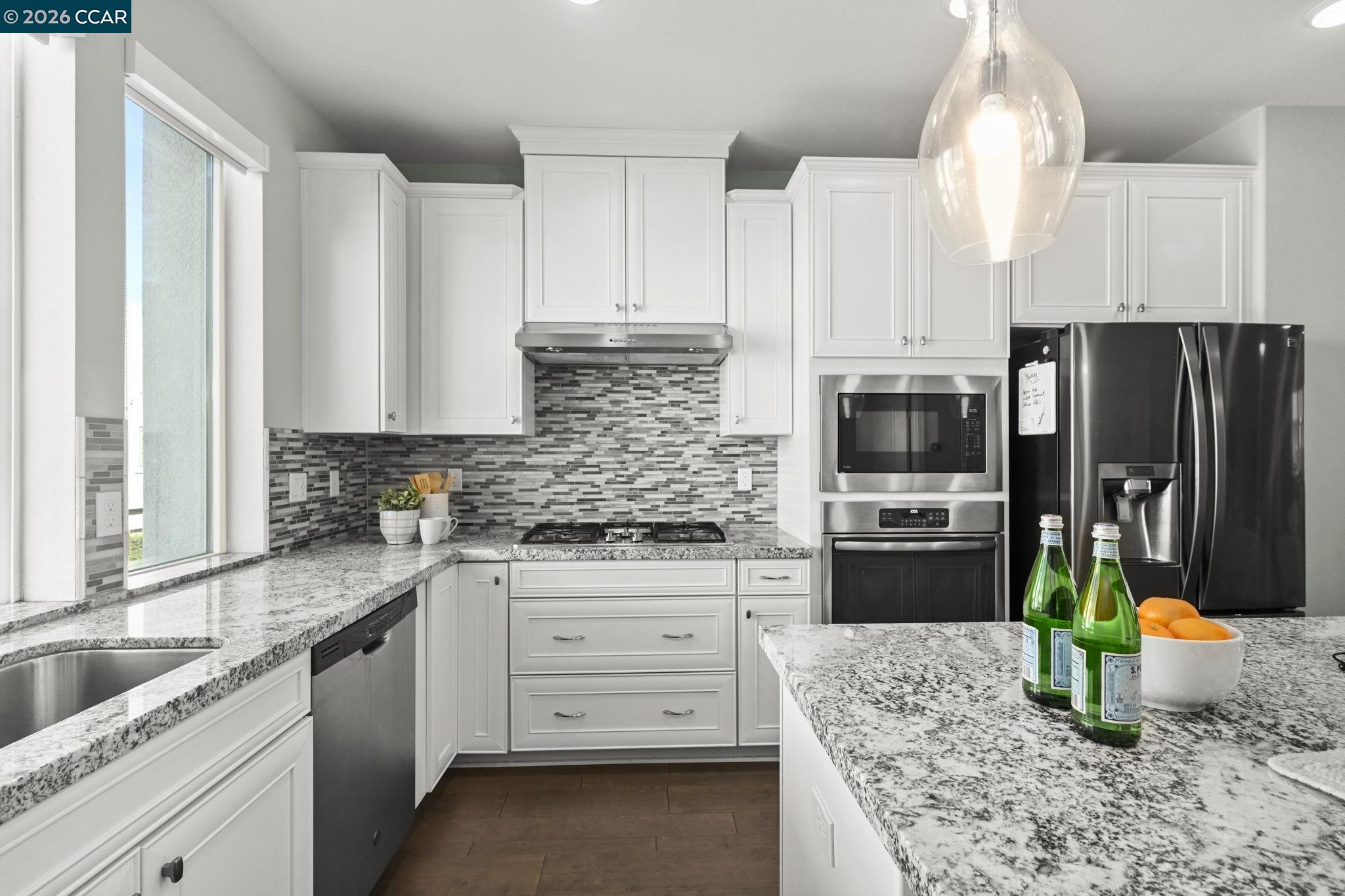 3923 Meridian Street Dublin, CA 94568 - Photo 16 of 39 a kitchen with a sink stove and refrigerator