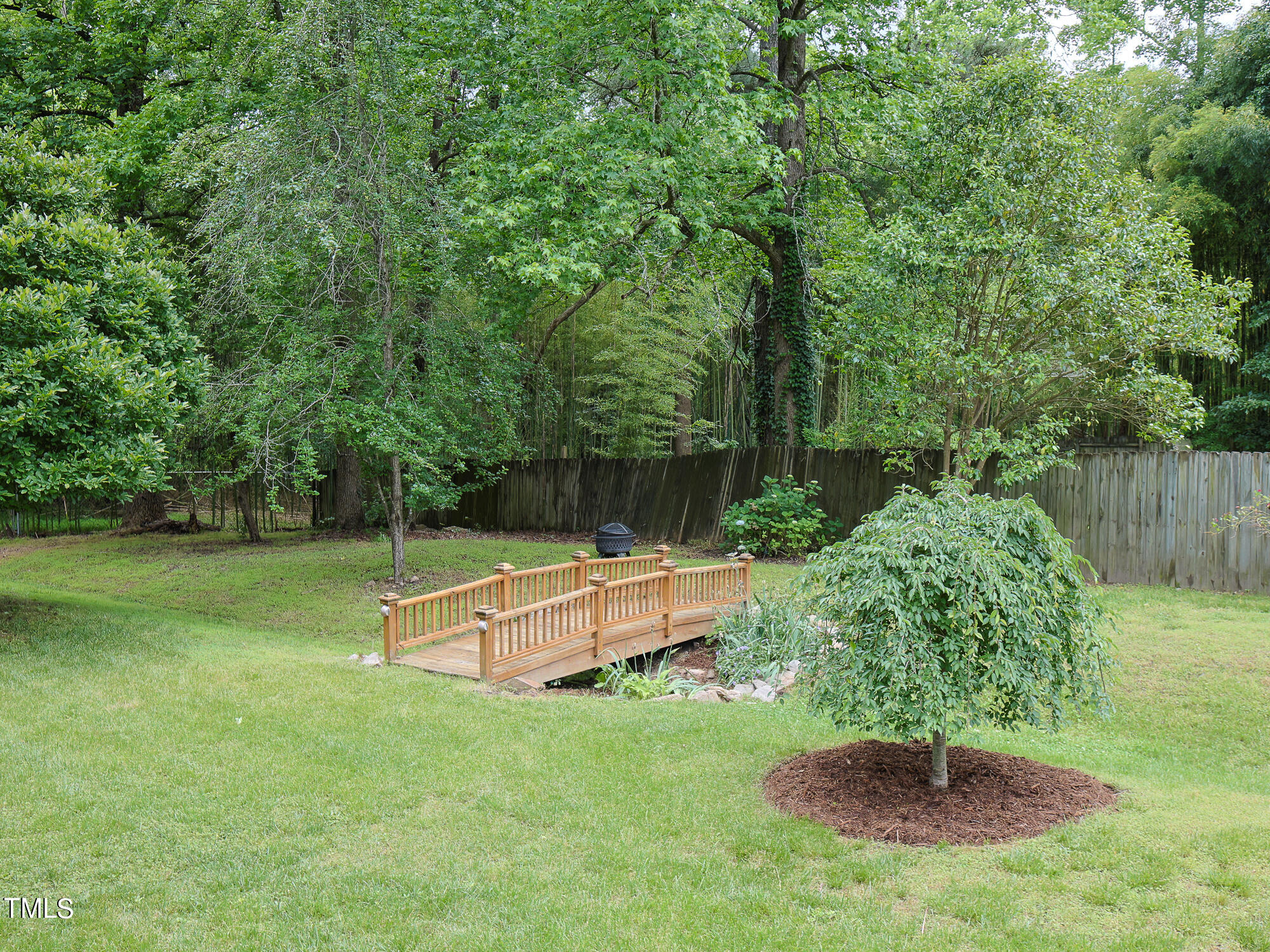 7208 Mine Shaft Road Raleigh, NC 27615 - Photo 26 of 29 a garden view with a seating space