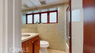 a bathroom with a sink and a toilet