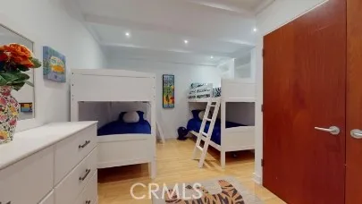 a bedroom with furniture and a fireplace