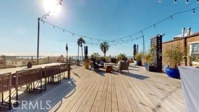 a view of a terrace with seating area