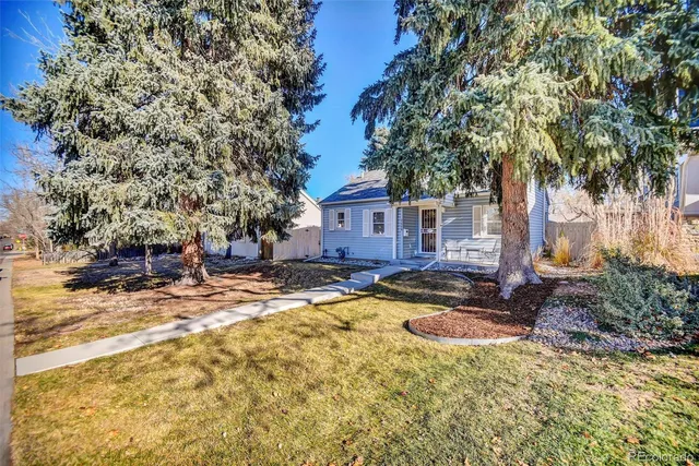 a view of a house with swimming pool