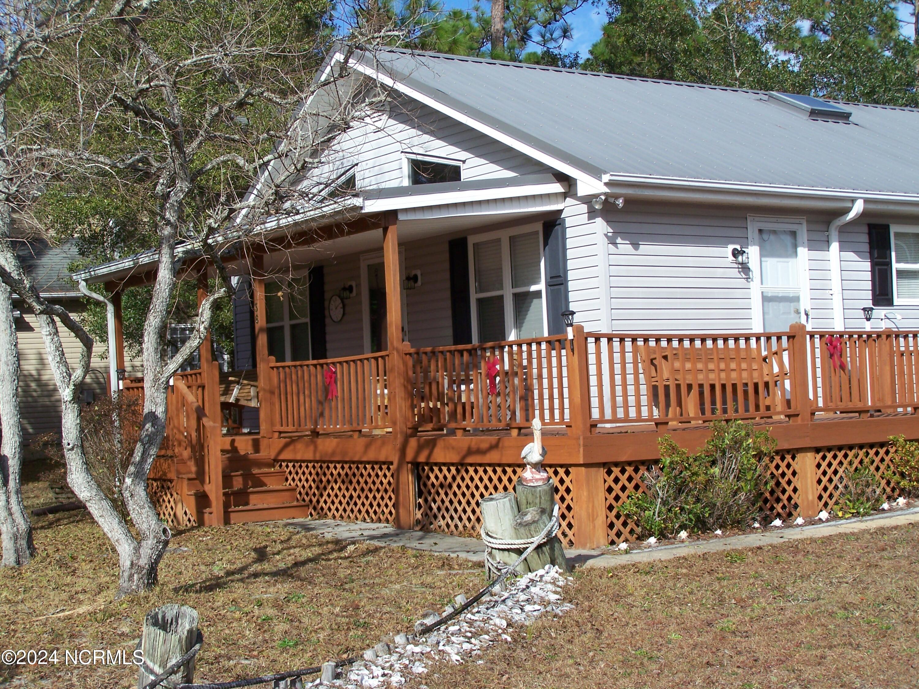 36 North Lake Drive Boiling Spring Lakes, NC 28461 - Photo 11 of 55 Right front corner