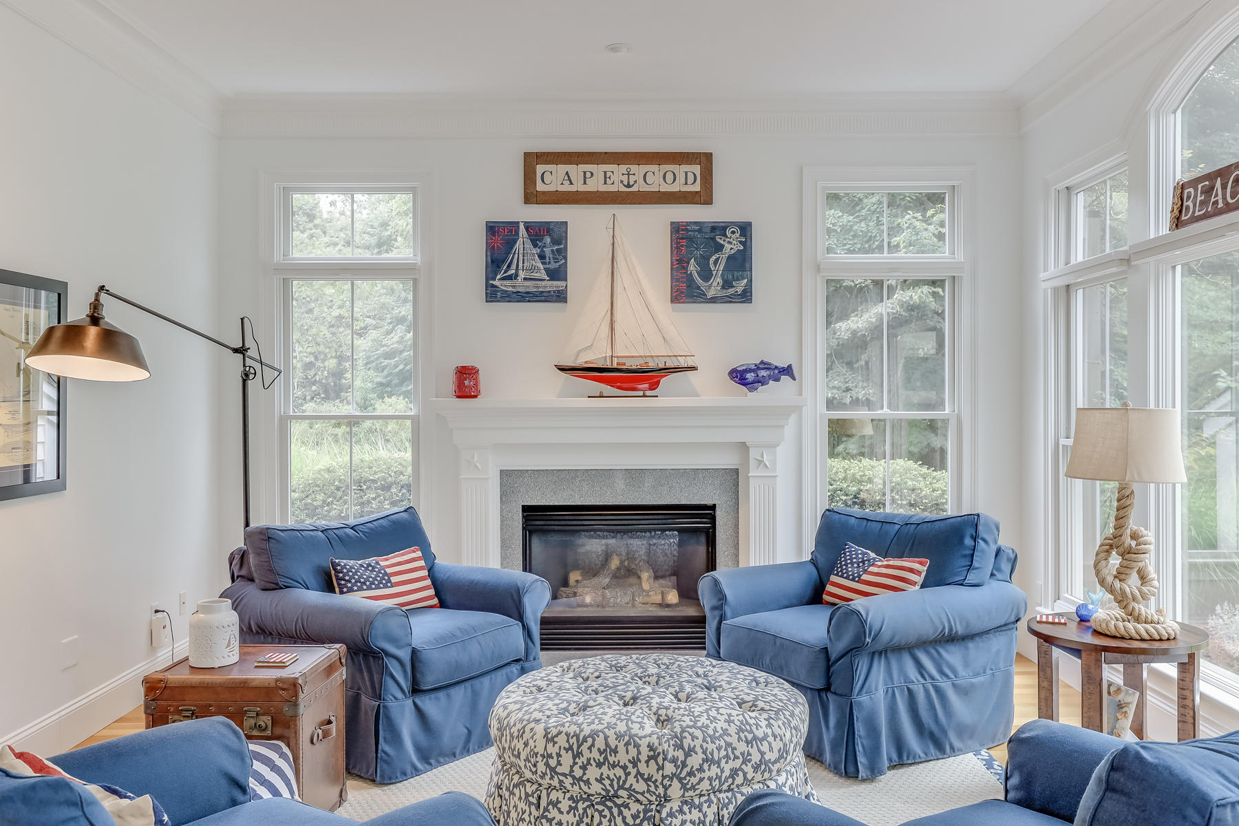 51 Meadow Farm Road Centerville, MA 02632 - Photo 17 of 45 a living room with furniture large window and fireplace