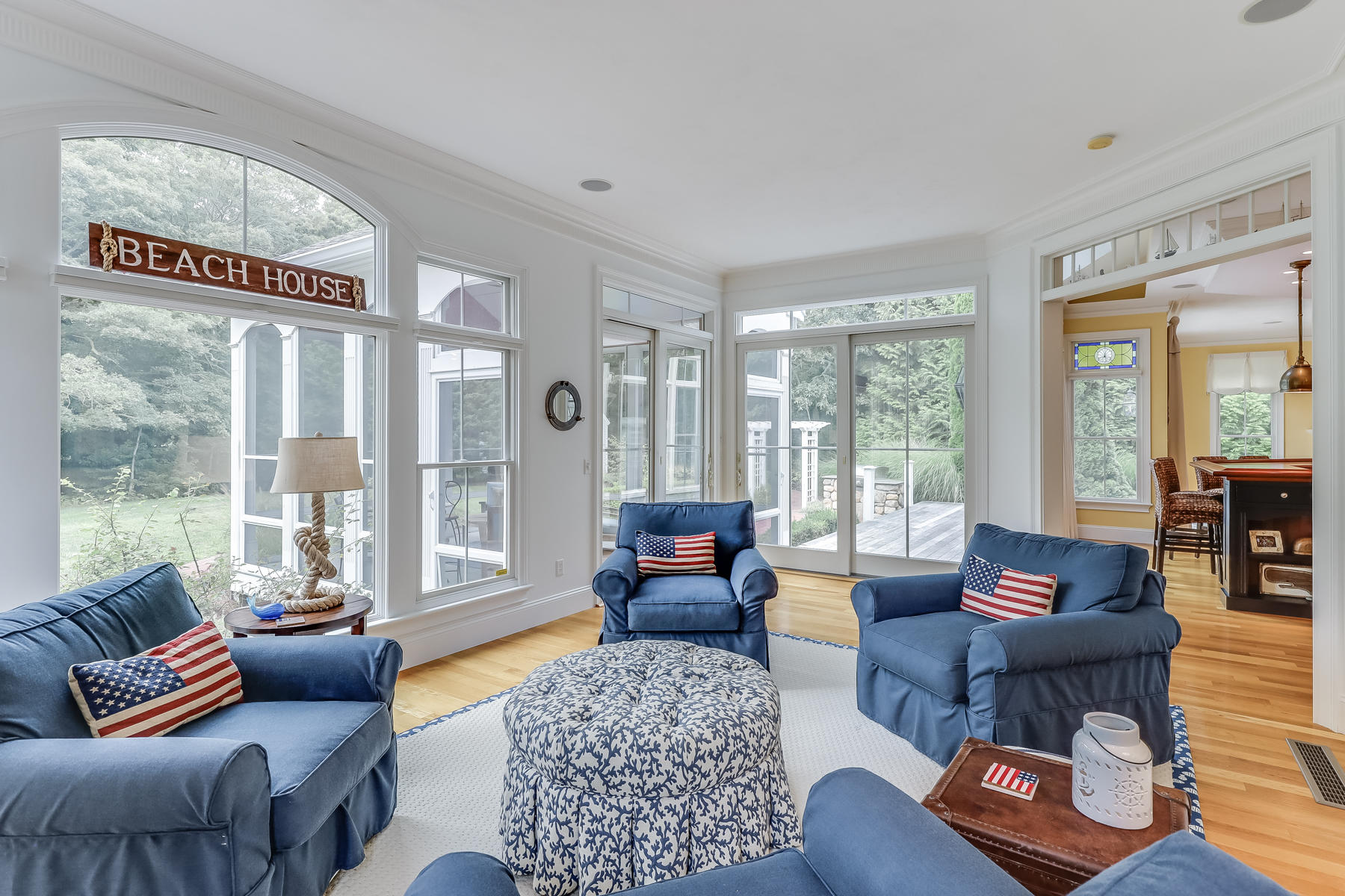 51 Meadow Farm Road Centerville, MA 02632 - Photo 18 of 45 a living room with furniture and a large window