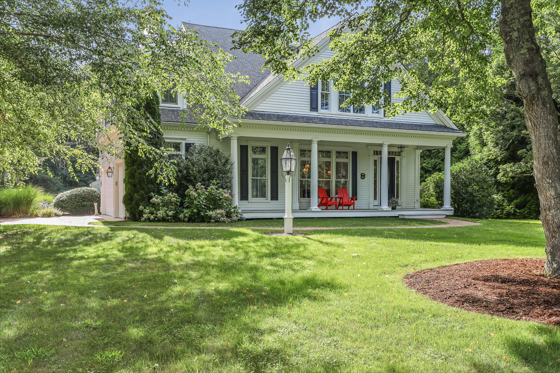 51 Meadow Farm Road Centerville, MA 02632 - Photo 2 of 45 a view of a house with a backyard and a large tree