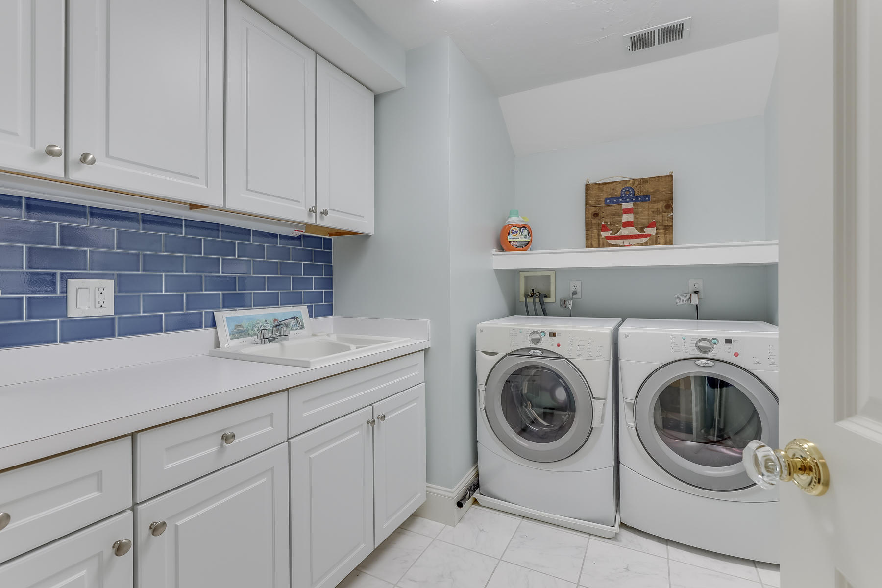 51 Meadow Farm Road Centerville, MA 02632 - Photo 28 of 45 a utility room with sink dryer and washer