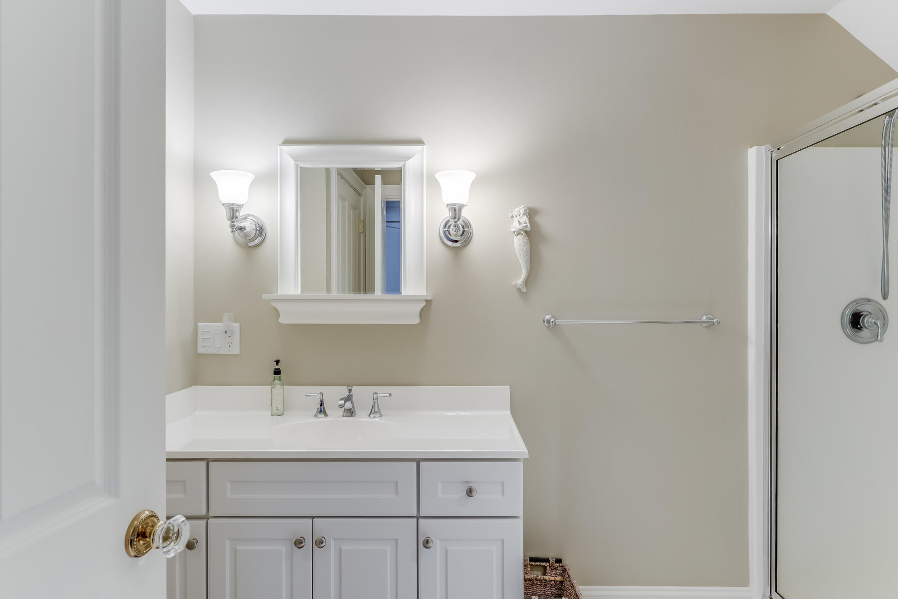 51 Meadow Farm Road Centerville, MA 02632 - Photo 30 of 45 a bathroom with a sink and mirror