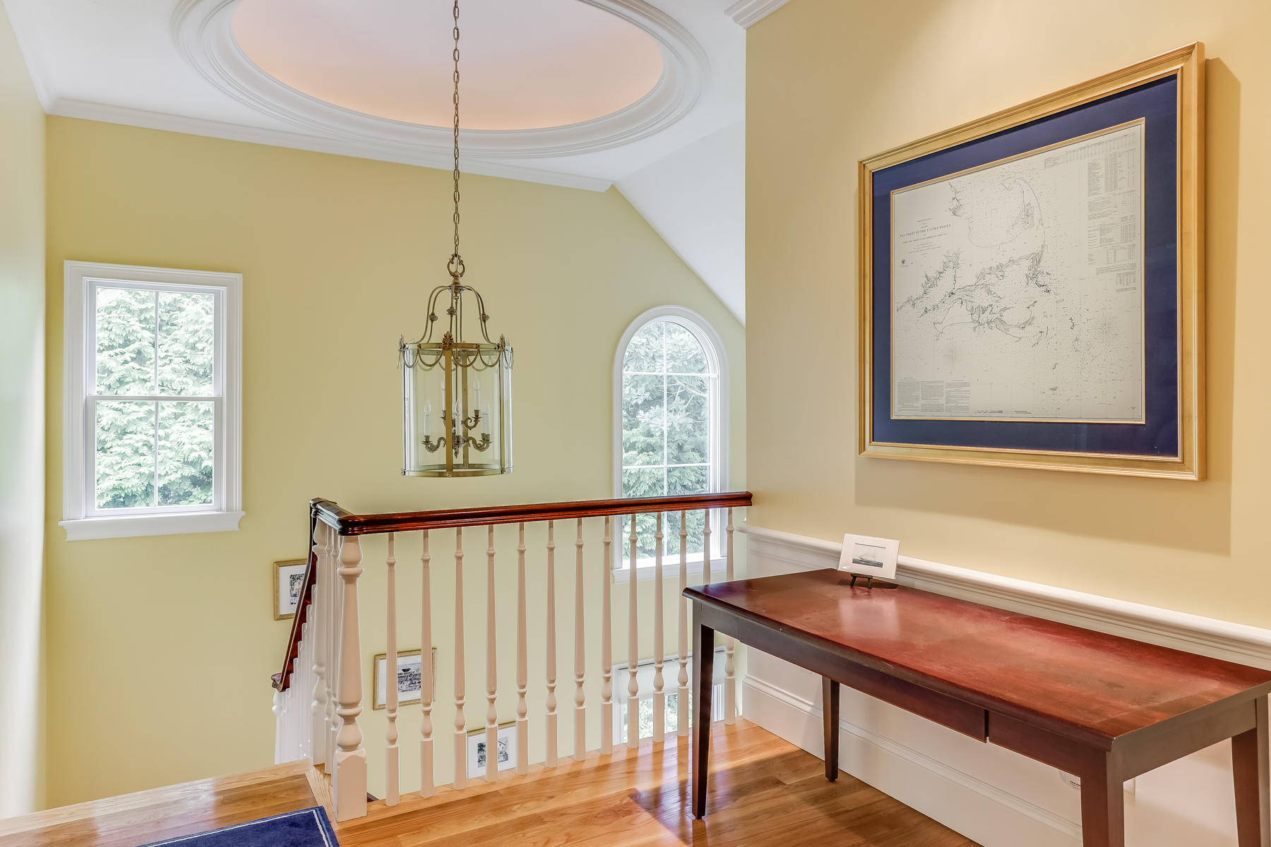 51 Meadow Farm Road Centerville, MA 02632 - Photo 31 of 45 a view of a hallway with windows
